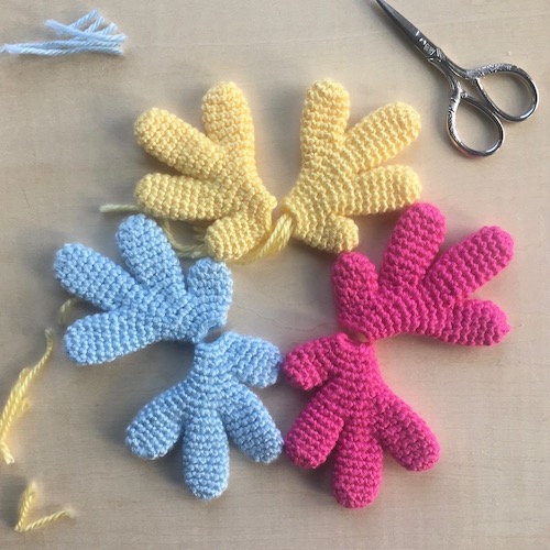 Three pairs of crocheted wings